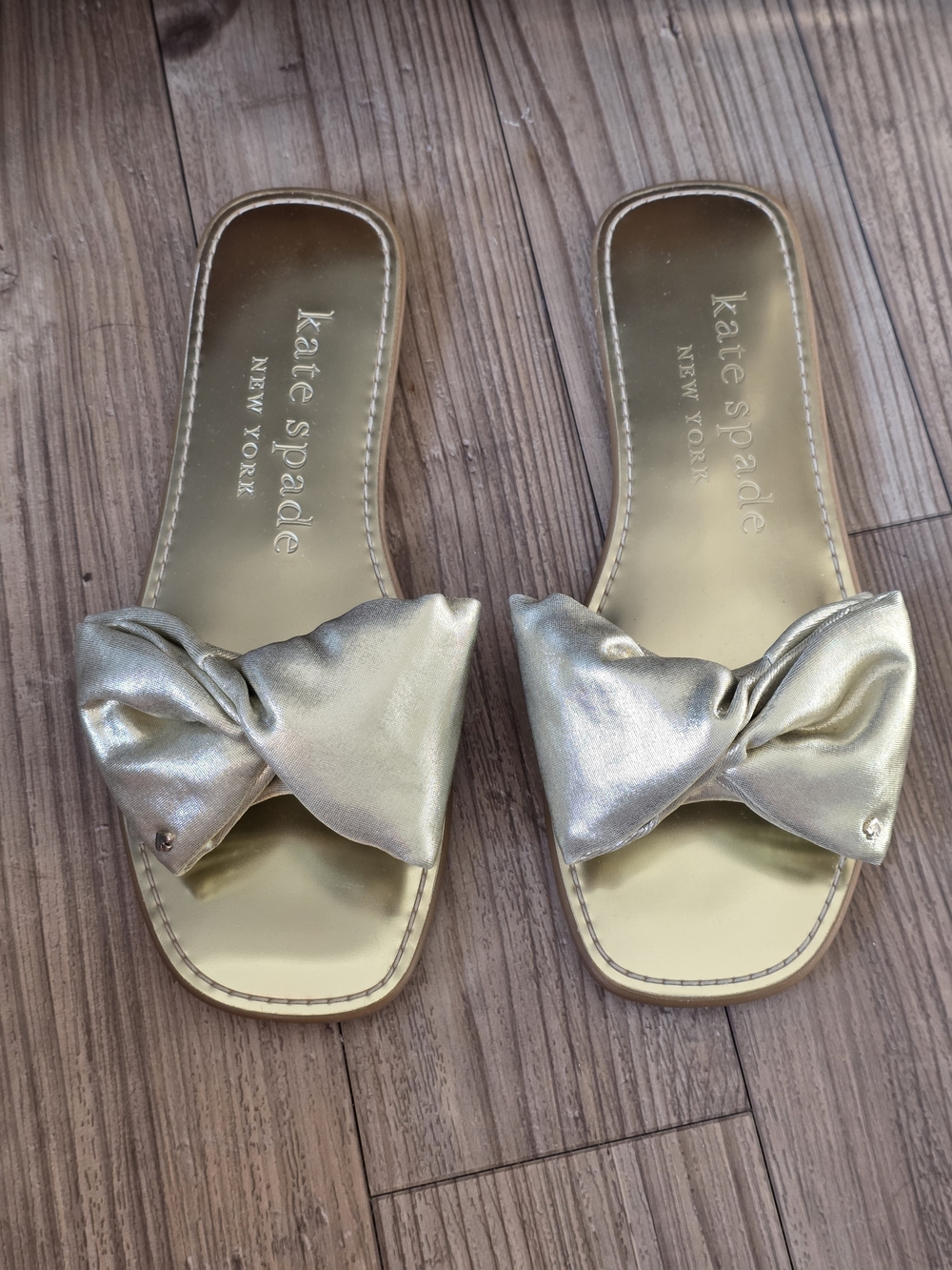 kate spade New York Metallic Gold Bow Slide Sandals